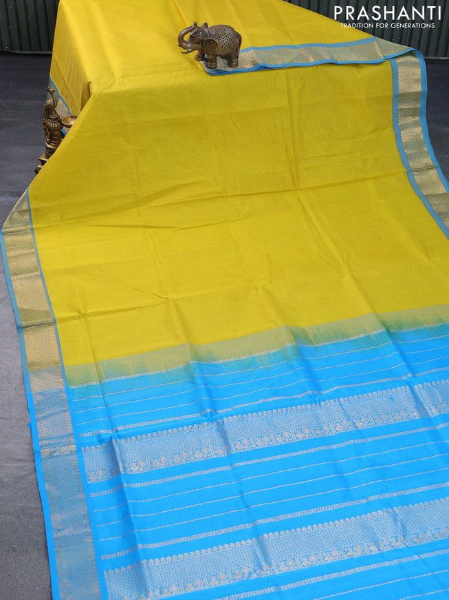 Silk cotton saree lime yellow and light blue with plain body and zari woven border