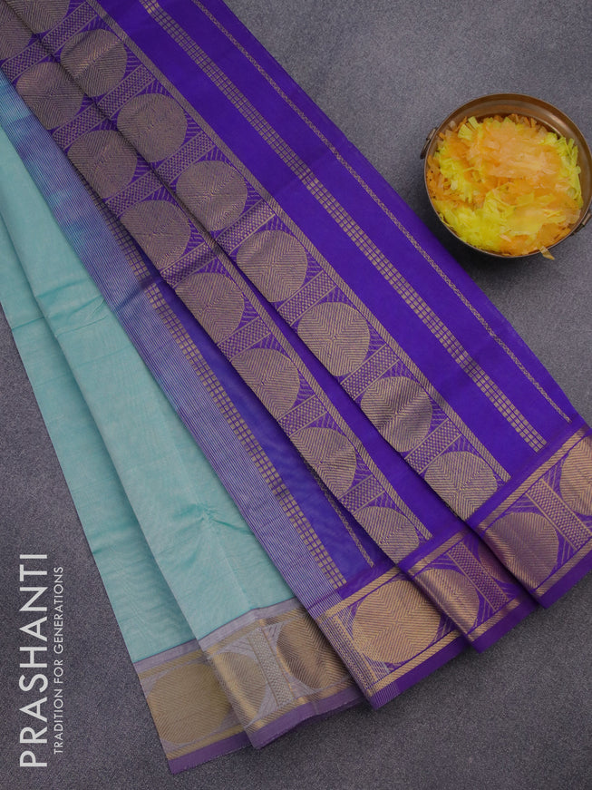 Silk cotton saree teal blue and blue with plain body and rudhraksha zari woven border