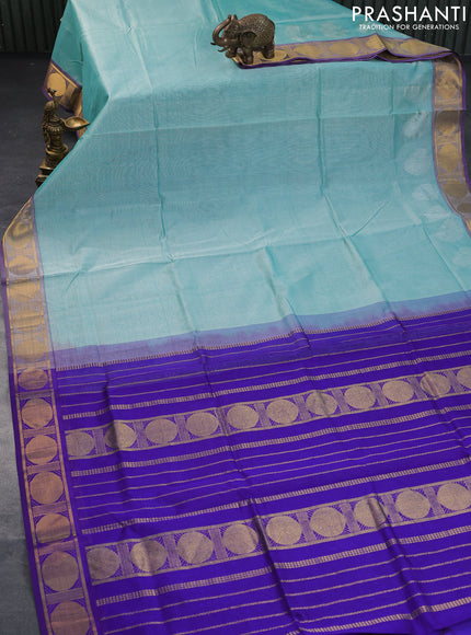 Silk cotton saree teal blue and blue with plain body and rudhraksha zari woven border