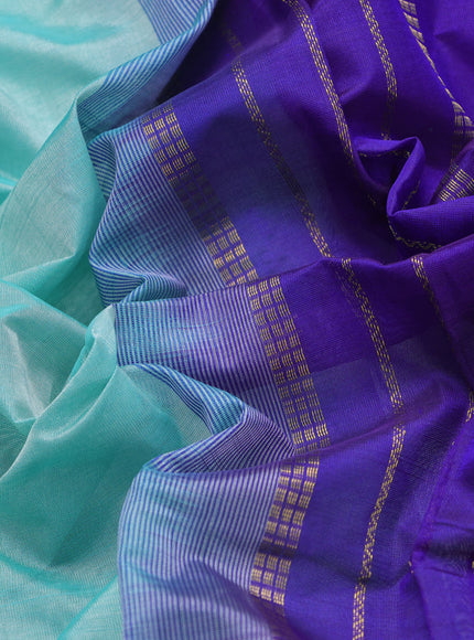 Silk cotton saree teal blue and blue with plain body and rudhraksha zari woven border