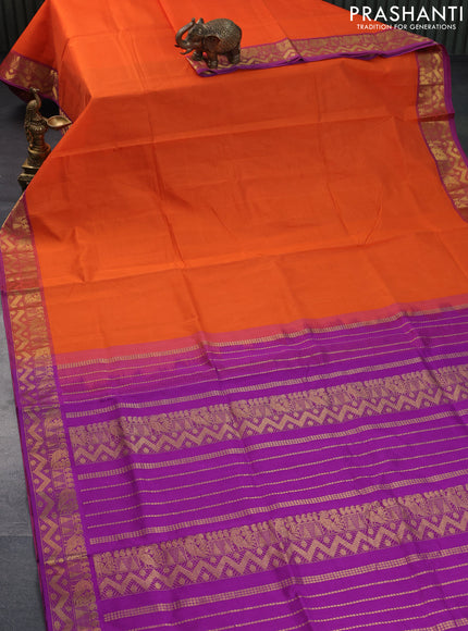 Silk cotton saree orange and purple with plain body and zari woven border