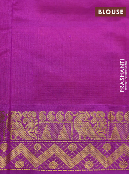 Silk cotton saree orange and purple with plain body and zari woven border