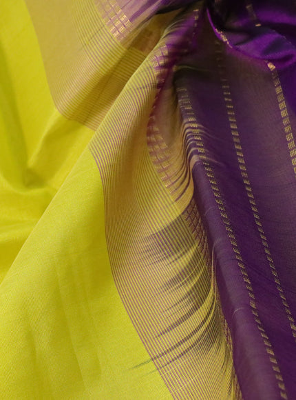 Silk cotton saree lime yellow and purple with plain body and zari woven border