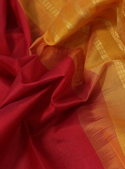 Silk cotton saree maroon and mustard yellow with plain body and zari woven border