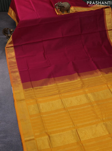 Silk cotton saree dark magenta pink and mustard yellow with plain body and zari woven border