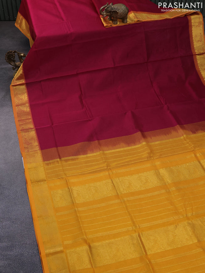 Silk cotton saree dark magenta pink and mustard yellow with plain body and zari woven border