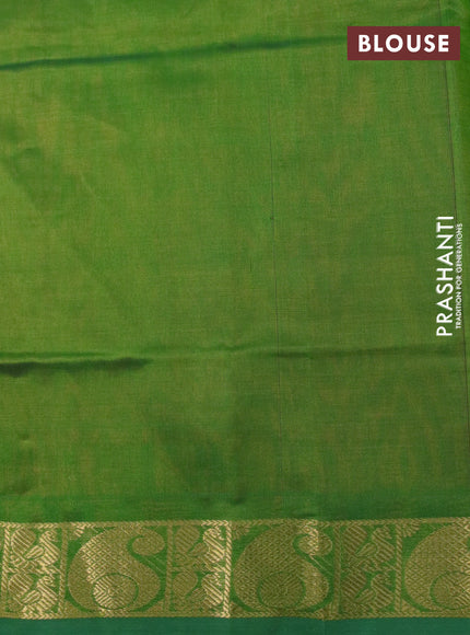 Silk cotton saree orange and light green with plain body and paisley zari woven border