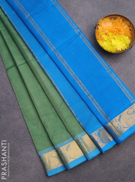 Silk cotton saree pastel green and cs blue with plain body and paisley zari woven border