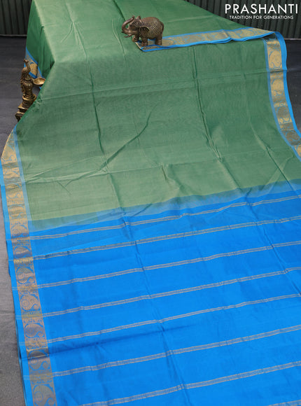 Silk cotton saree pastel green and cs blue with plain body and paisley zari woven border