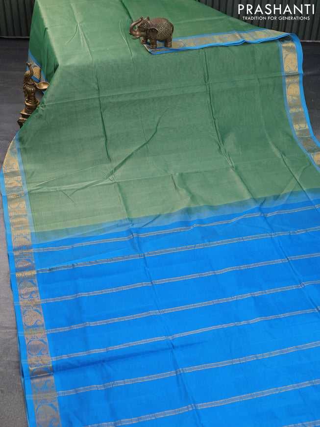 Silk cotton saree pastel green and cs blue with plain body and paisley zari woven border