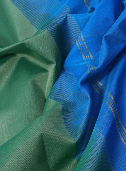 Silk cotton saree pastel green and cs blue with plain body and paisley zari woven border