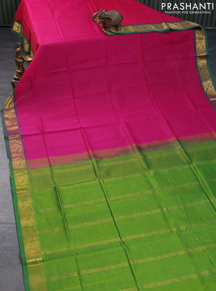 Silk cotton saree pink and light green with plain body and paisley zari woven border