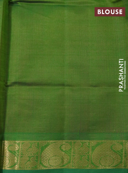 Silk cotton saree pink and light green with plain body and paisley zari woven border