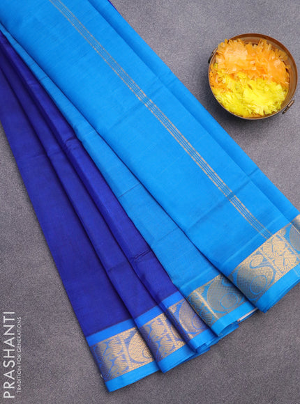 Silk cotton saree blue and cs blue with plain body and paisley zari woven border