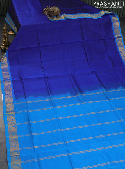 Silk cotton saree blue and cs blue with plain body and paisley zari woven border