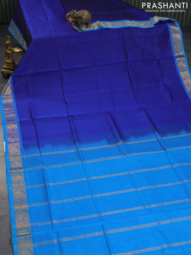 Silk cotton saree blue and cs blue with plain body and paisley zari woven border