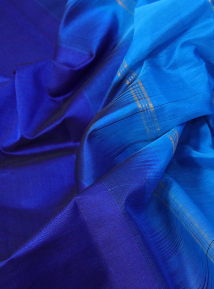 Silk cotton saree blue and cs blue with plain body and paisley zari woven border