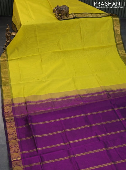 Silk cotton saree light green and purple with plain body and paisley zari woven border