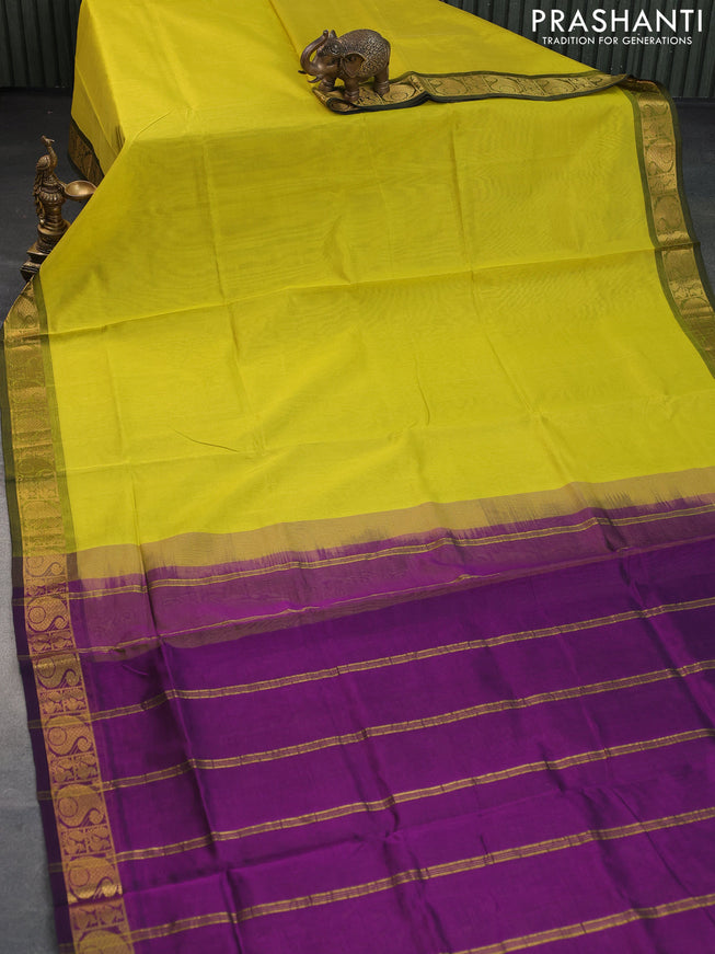 Silk cotton saree light green and purple with plain body and paisley zari woven border