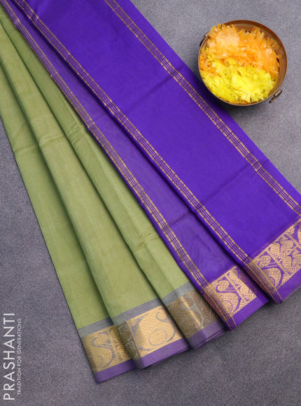 Silk cotton saree pastel green and blue with plain body and paisley zari woven border