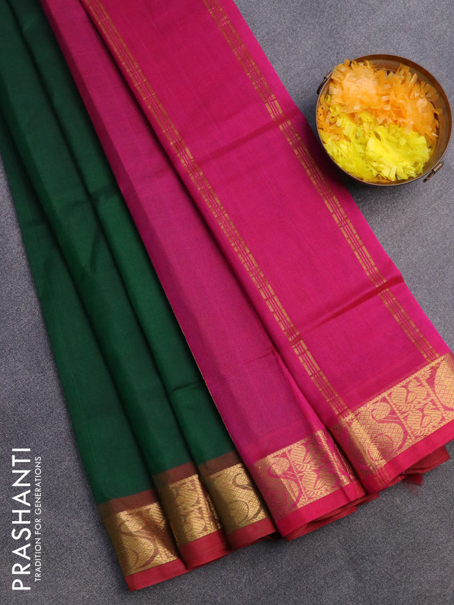 Silk cotton saree green and pink with plain body and paisley zari woven border