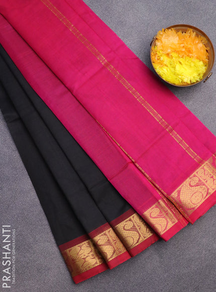 Silk cotton saree black and pink with plain body and paisley zari woven border