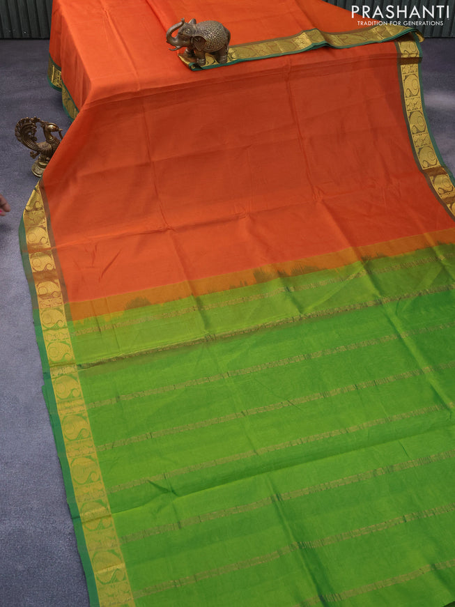 Silk cotton saree orange and green with plain body and paisley zari woven border