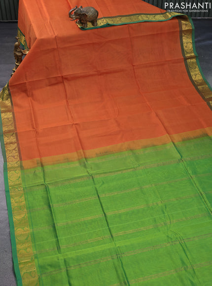 Silk cotton saree orange and green with plain body and paisley zari woven border