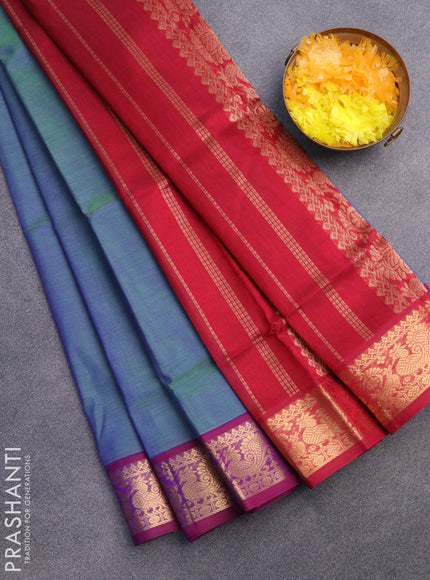 Silk cotton saree dual shade of bluish green and maroon with plain body and annam zari woven border