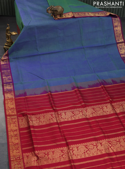 Silk cotton saree dual shade of bluish green and maroon with plain body and annam zari woven border