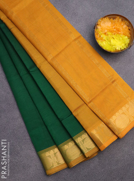 Silk cotton saree green and mustard yellow with plain body and rudhraksha zari woven border