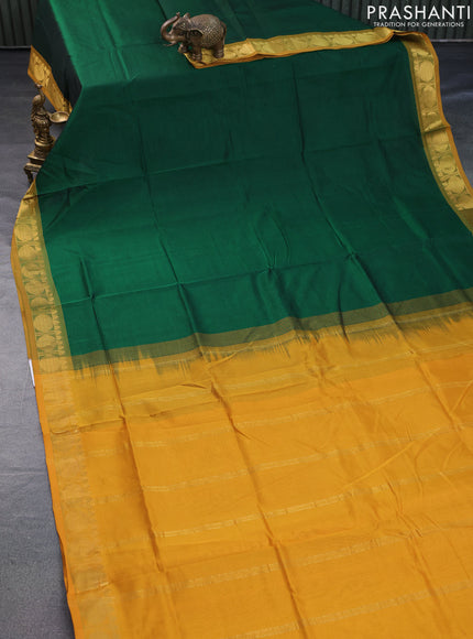 Silk cotton saree green and mustard yellow with plain body and rudhraksha zari woven border