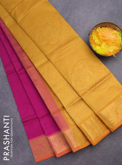 Silk cotton saree magenta pink and mustard yellow with plain body and zari woven border