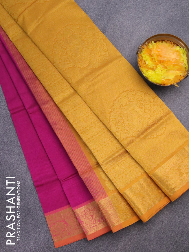 Silk cotton saree magenta pink and mustard yellow with plain body and zari woven border