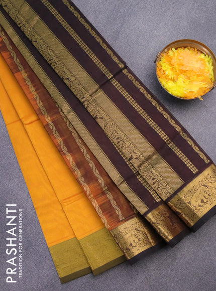 Silk cotton saree mango yellow and coffee brown with plain body and zari woven border