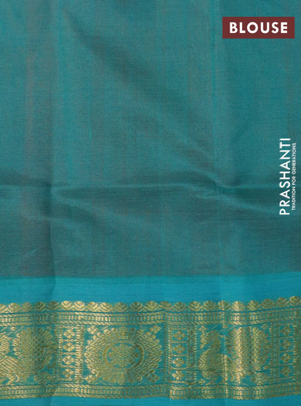 Silk cotton saree orange and teal green with plain body and annam zari woven border