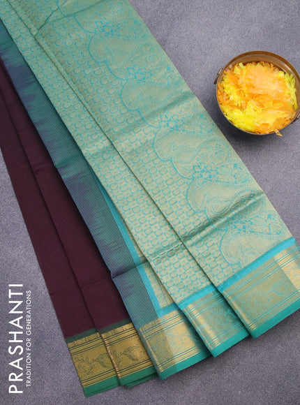 Silk cotton saree wine shade and green with plain body and zari woven border