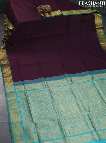 Silk cotton saree wine shade and green with plain body and zari woven border