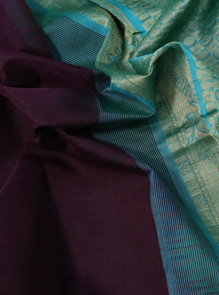 Silk cotton saree wine shade and green with plain body and zari woven border