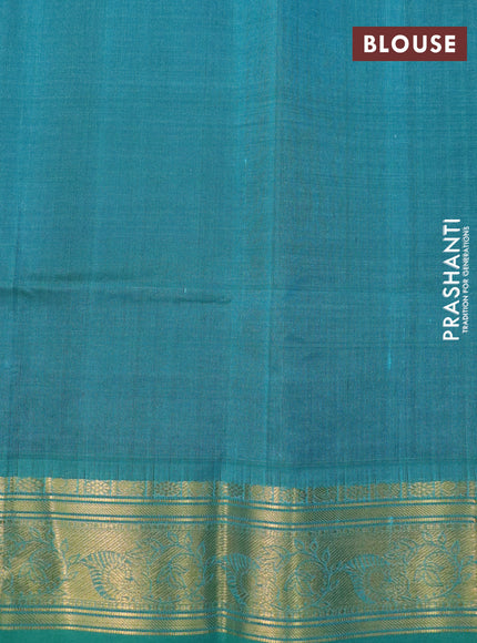 Silk cotton saree wine shade and green with plain body and zari woven border