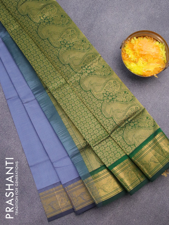 Silk cotton saree grey and green with plain body and zari woven border