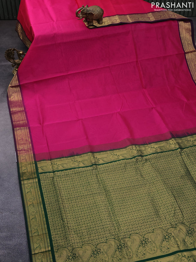 Silk cotton saree pink and green with plain body and zari woven border