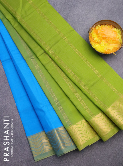 Silk cotton saree cs blue and light green with plain body and zari woven border