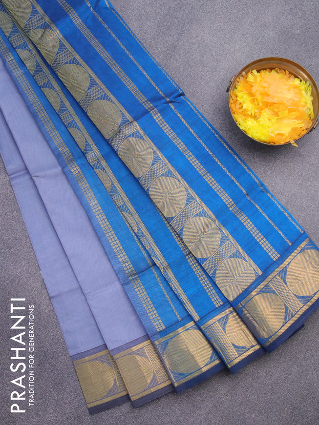 Silk cotton saree grey and cs blue with plain body and rudhraksha zari woven border