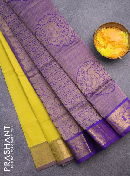 Silk cotton saree lime yellow and blue with plain body and zari woven border