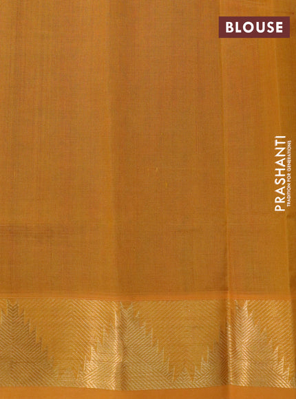 Silk cotton saree dual shade of maroonish green and mango yellow with plain body and temple design zari woven border