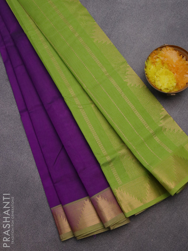 Silk cotton saree violet and light green with plain body and temple design zari woven border