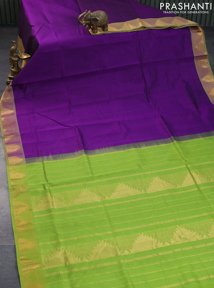 Silk cotton saree violet and light green with plain body and temple design zari woven border