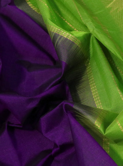 Silk cotton saree violet and light green with plain body and temple design zari woven border