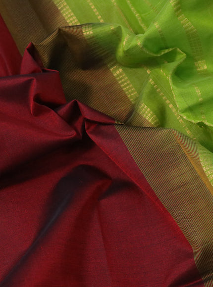 Silk cotton saree maroon and light green with plain body and temple design zari woven border